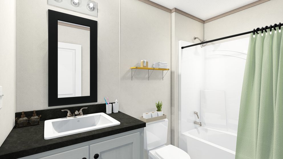 The 5628-E786 THE PULSE Guest Bathroom. This Manufactured Mobile Home features 3 bedrooms and 2 baths.
