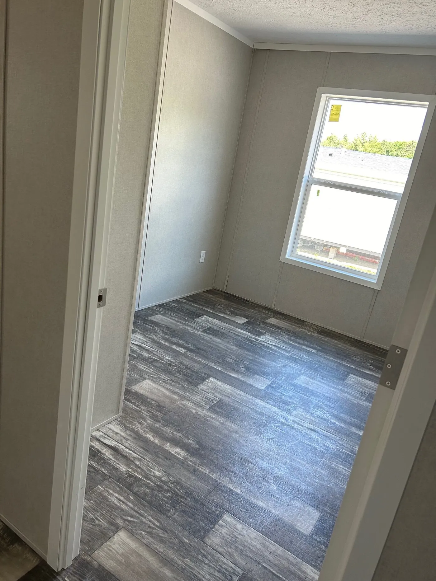 The SAPPHIRE XL 8016-644 Guest Bedroom. This Manufactured Mobile Home features 3 bedrooms and 2 baths.