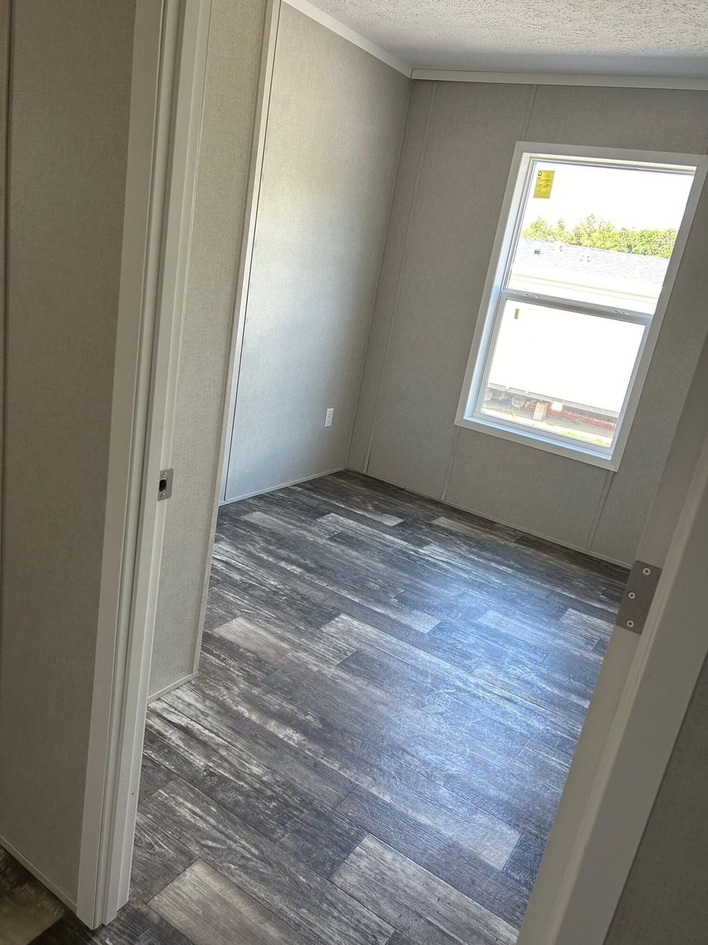 The SAPPHIRE XL 8016-644 Guest Bedroom. This Manufactured Mobile Home features 3 bedrooms and 2 baths.