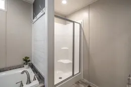 The ANNIVERSARY CHOICE Primary Bathroom. This Manufactured Mobile Home features 3 bedrooms and 2 baths.
