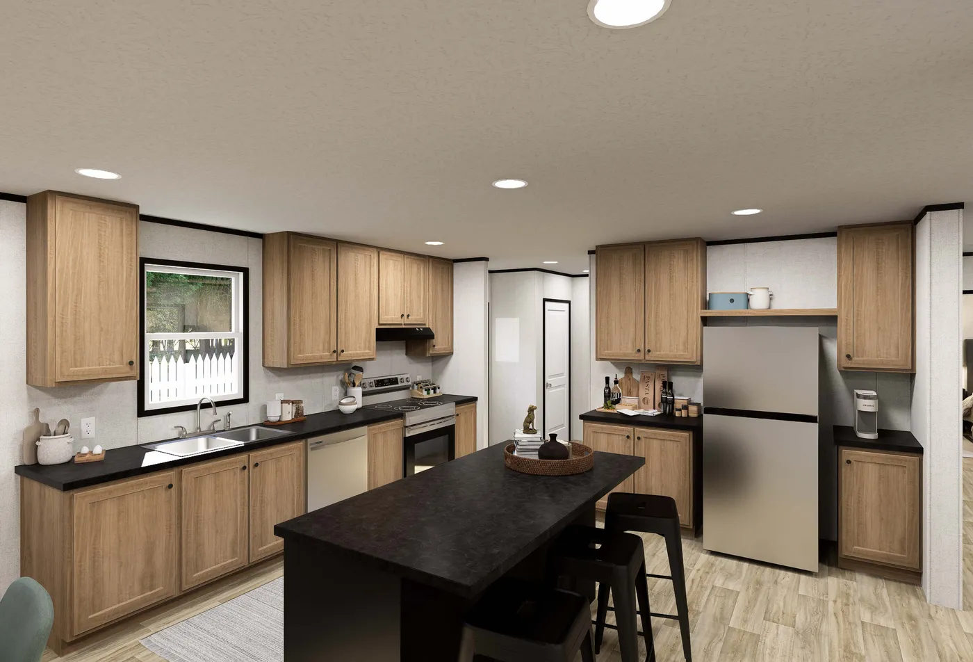 The DAWN Kitchen. This Manufactured Mobile Home features 3 bedrooms and 2 baths.