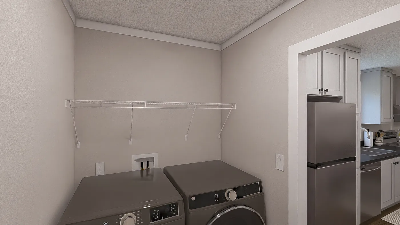 The WONDERFUL WORLD Utility Room. This Manufactured Mobile Home features 3 bedrooms and 2 baths.