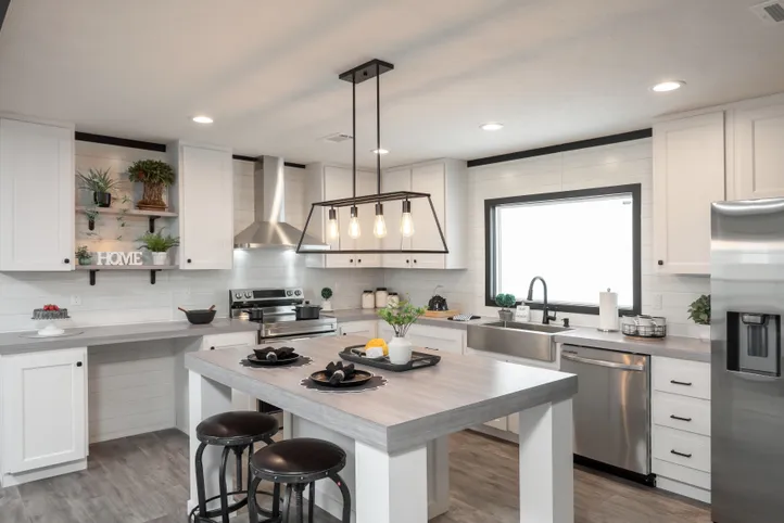 The BREEZE FARMHOUSE Kitchen. This Manufactured Mobile Home features 3 bedrooms and 2 baths.