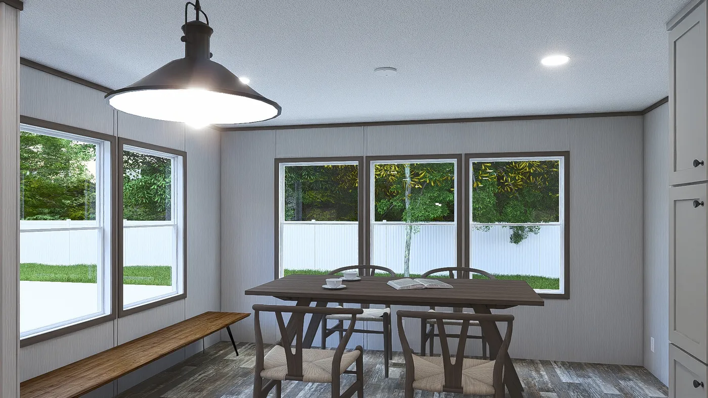 The ULTRA PRO JEWEL 3 BR 32X60 Dining Area. This Manufactured Mobile Home features 3 bedrooms and 2 baths.