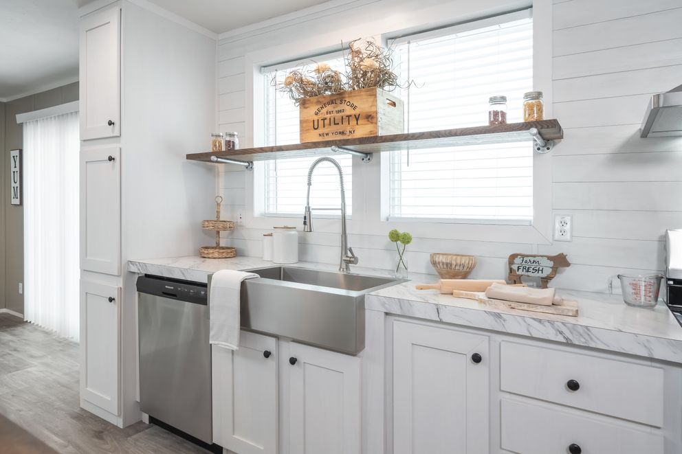 The THE RESERVE 60 Kitchen. This Manufactured Mobile Home features 3 bedrooms and 2 baths.