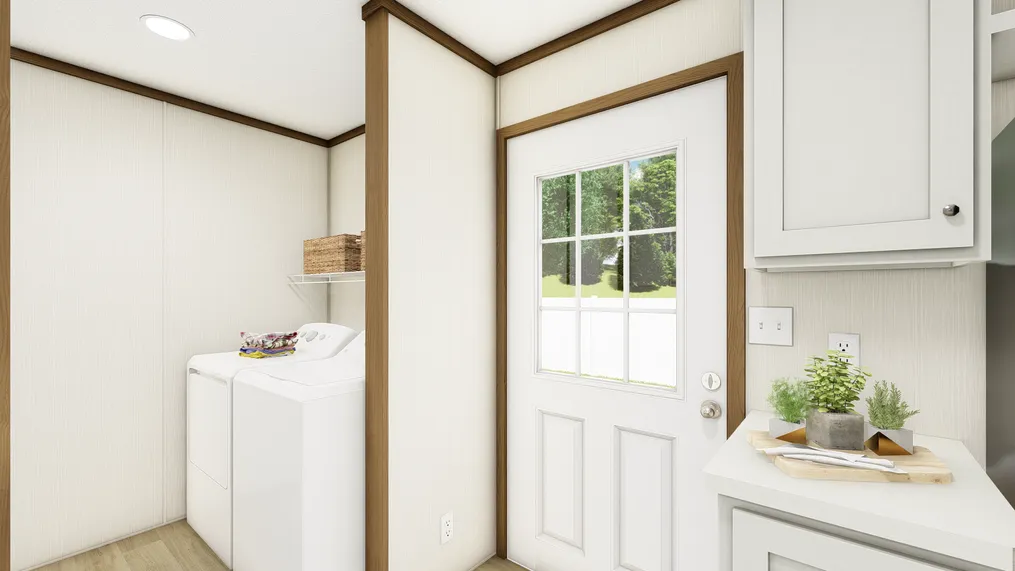 The DYNAMIC Utility Room. This Manufactured Mobile Home features 3 bedrooms and 2 baths.