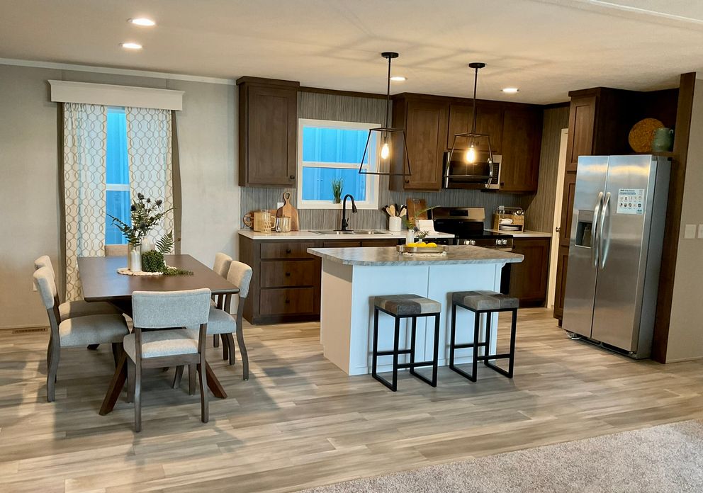 The AMETHYST Dining Area. This Manufactured Mobile Home features 3 bedrooms and 2 baths.