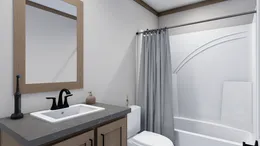 The FARM 3 FLEX Guest Bathroom. This Manufactured Mobile Home features 4 bedrooms and 3 baths.