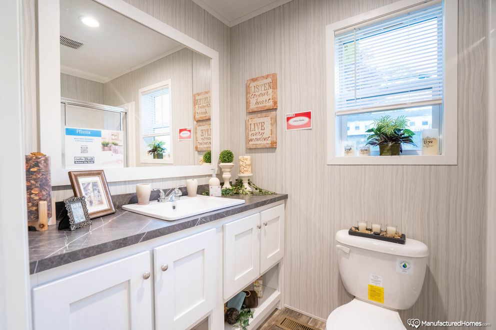The TOPAZ 70 Primary Bathroom. This Manufactured Mobile Home features 3 bedrooms and 2 baths.