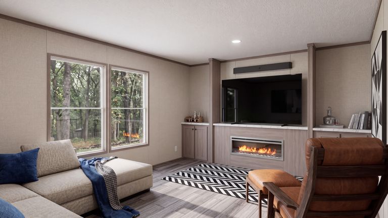 The THE MOUNTAINEER 60 Den. This Manufactured Mobile Home features 3 bedrooms and 2 baths.
