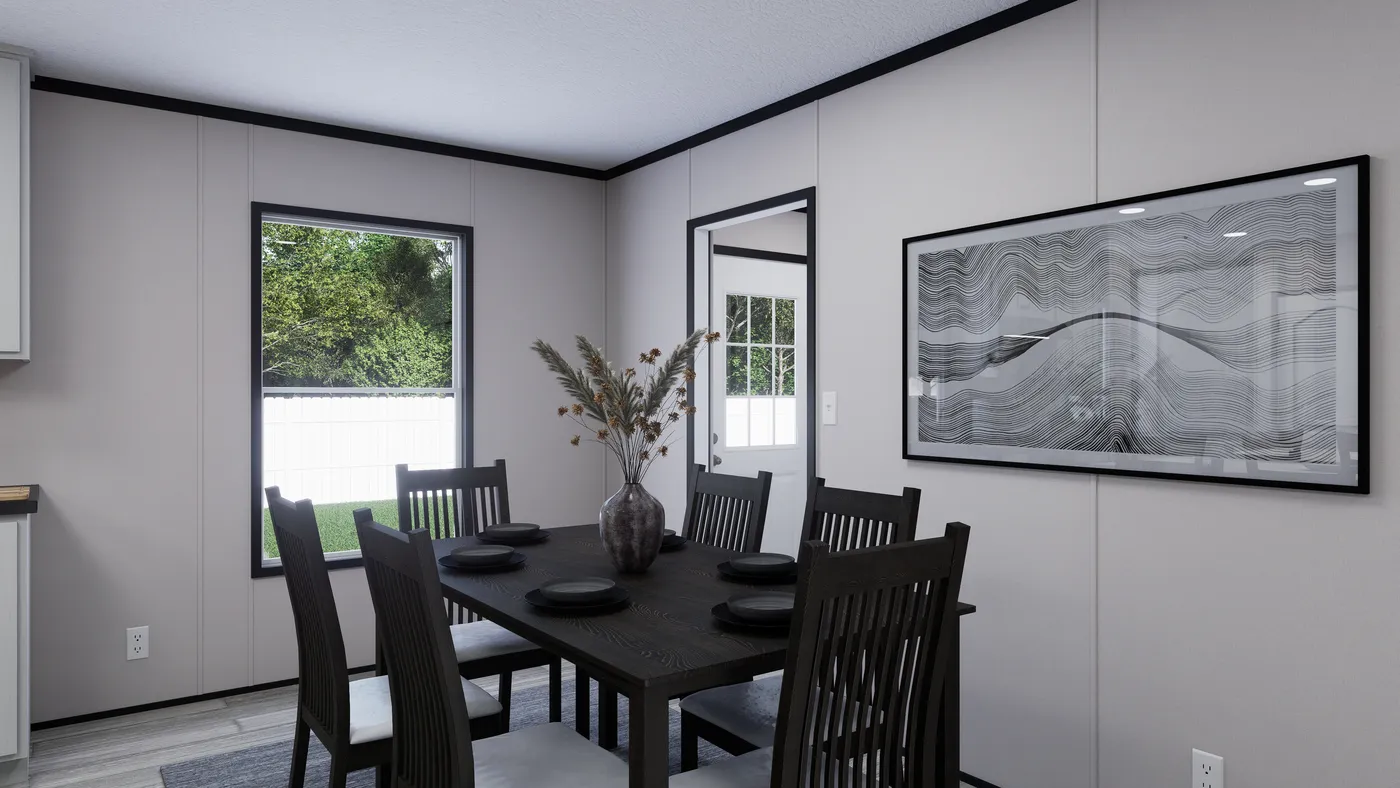 The THE MOUNTAINEER 56 Dining Area. This Manufactured Mobile Home features 3 bedrooms and 2 baths.