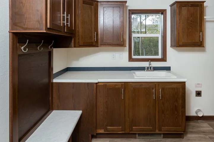 The LEGEND 86 Utility Room. This Manufactured Mobile Home features 3 bedrooms and 2 baths.