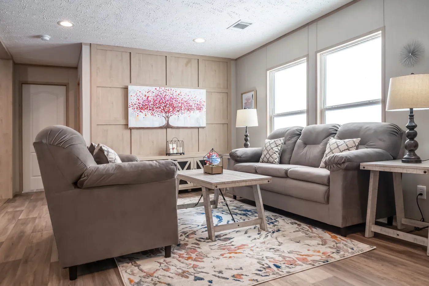 The DESOTO Living Room. This Manufactured Mobile Home features 3 bedrooms and 2 baths.