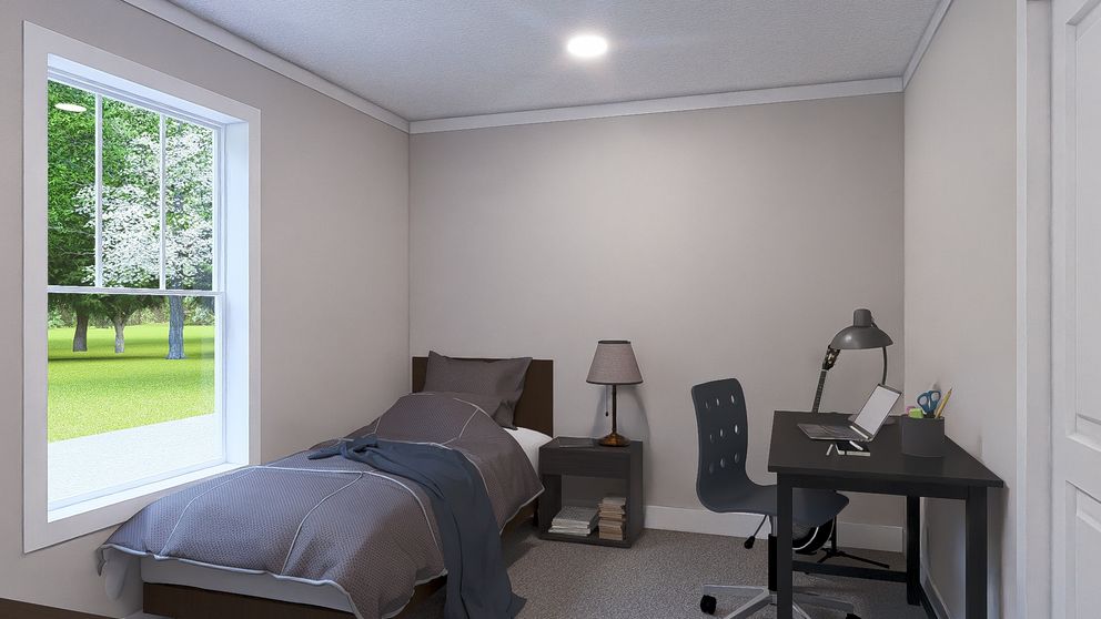 The SHOUT Guest Bedroom. This Manufactured Mobile Home features 3 bedrooms and 2 baths.