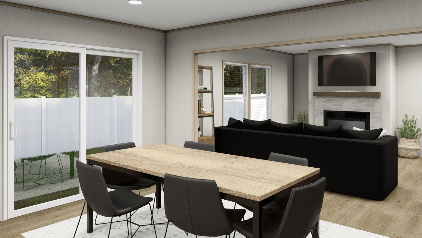 The KING AIR Dining Area. This Manufactured Mobile Home features 4 bedrooms and 2 baths.