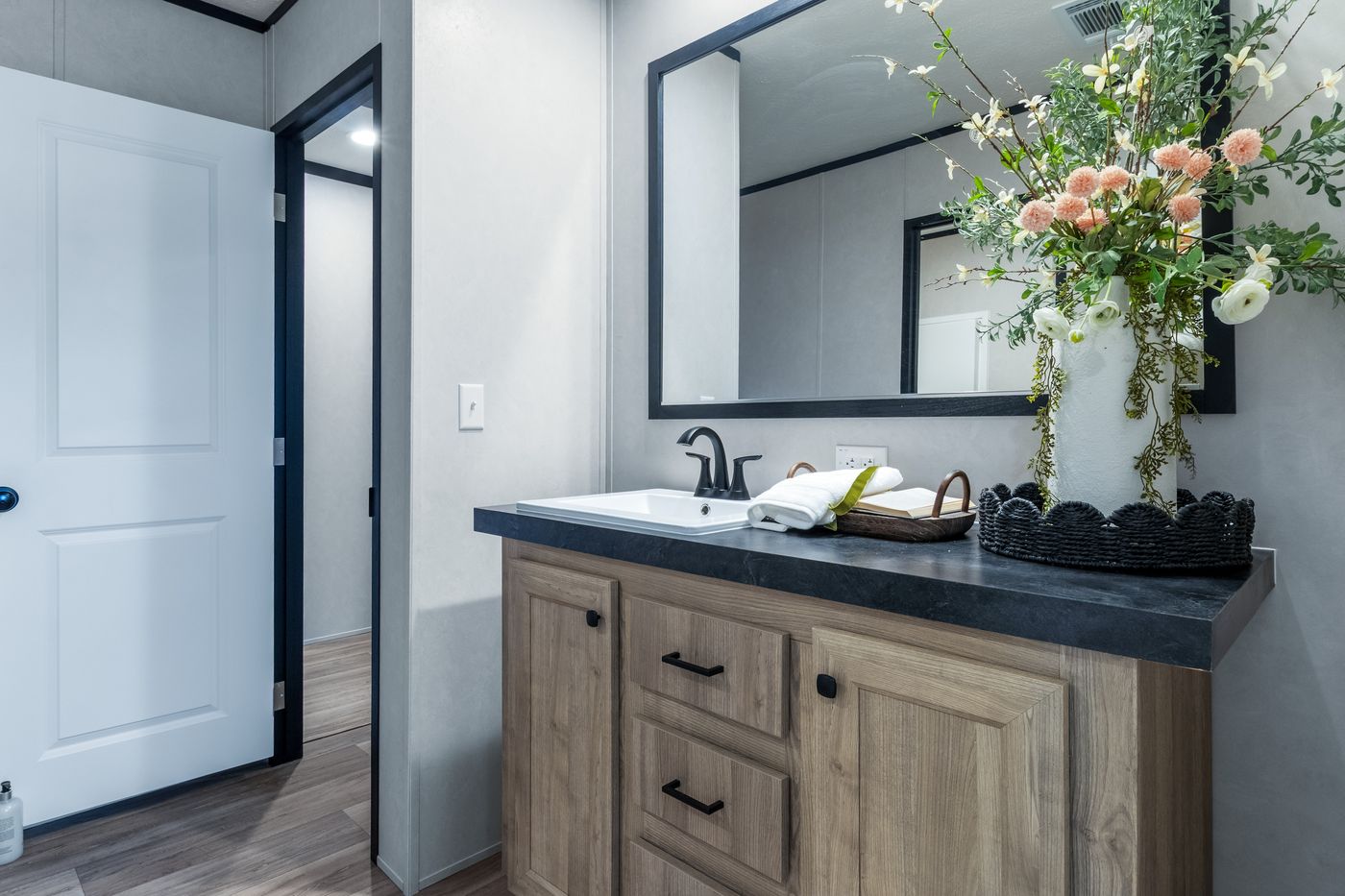 The ODYSSEY Guest Bathroom. This Manufactured Mobile Home features 4 bedrooms and 2 baths.