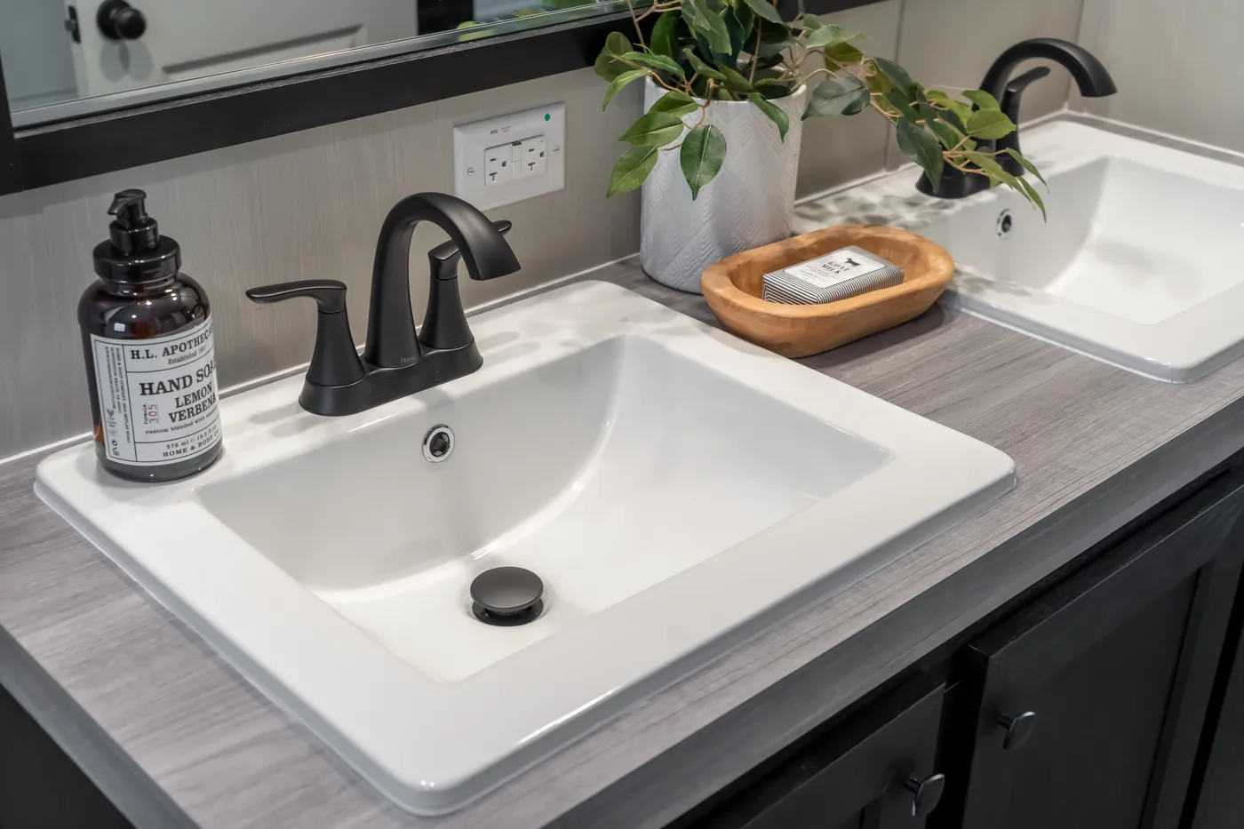 The CRAZY EIGHTS Primary Bathroom. This Manufactured Mobile Home features 4 bedrooms and 2 baths.