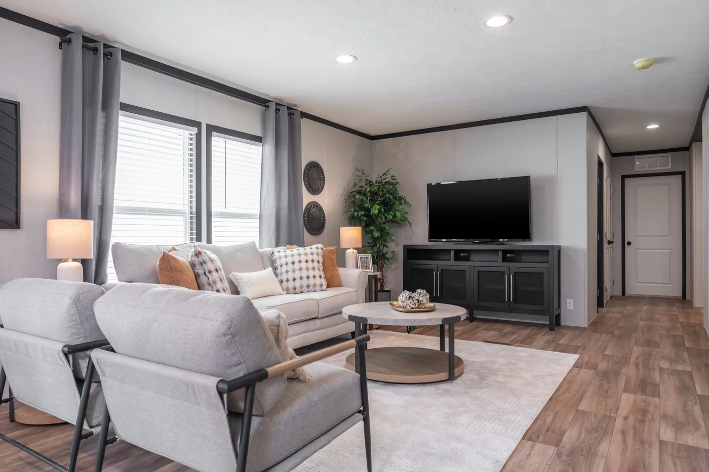 The ABSOLUTE VALUE Den. This Manufactured Mobile Home features 4 bedrooms and 2 baths.