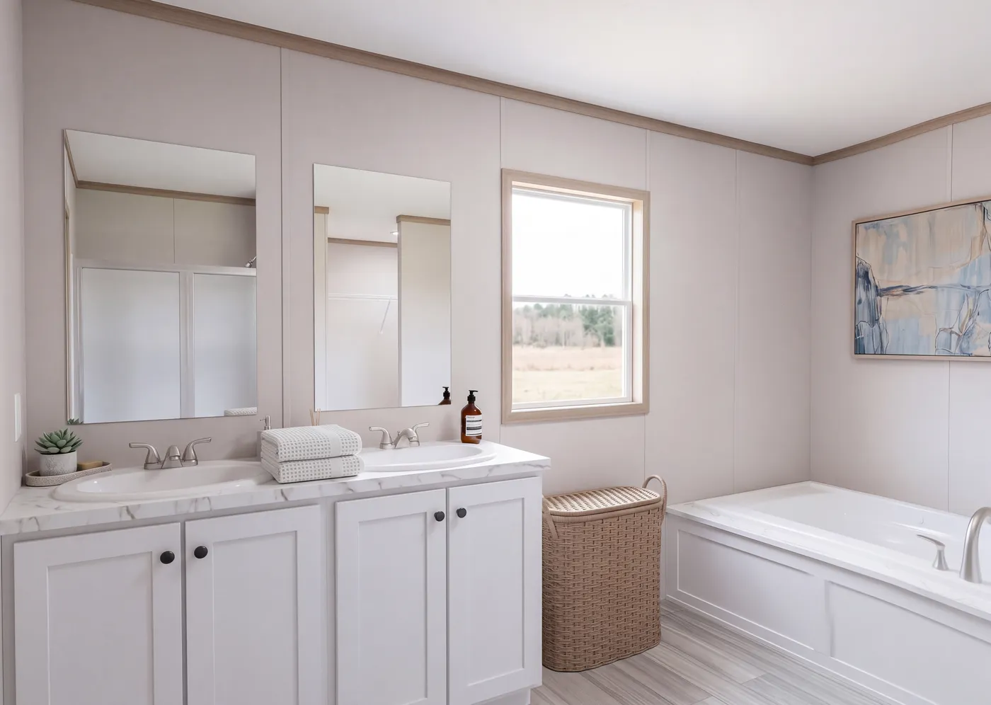 The THE MOUNTAINEER 76 Primary Bathroom. This Manufactured Mobile Home features 4 bedrooms and 2 baths.