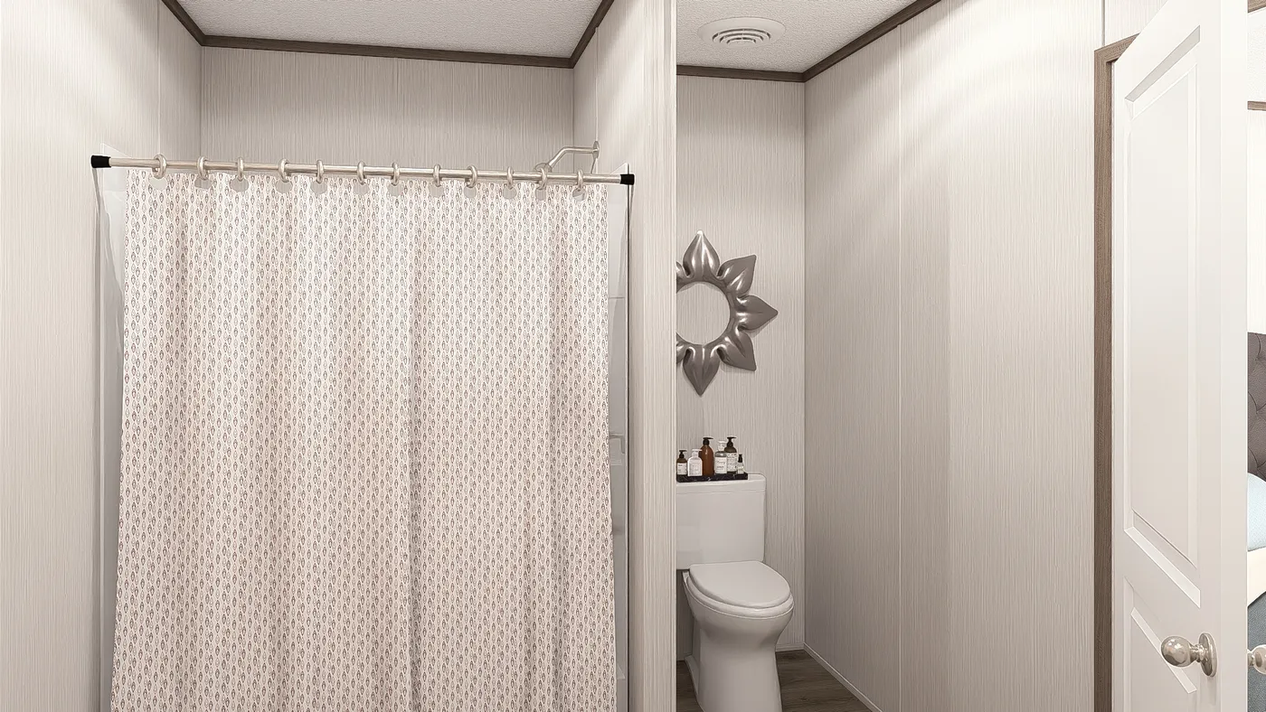 The LEGEND ANNIVERSARY 16X76 Primary Bathroom. This Manufactured Mobile Home features 3 bedrooms and 2 baths.
