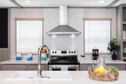The PLATINUM ANNIVERSARY Kitchen. This Manufactured Mobile Home features 3 bedrooms and 2 baths.