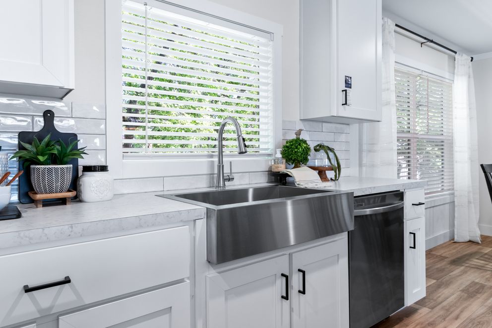 The FARM 4 FLEX ELITE Kitchen. This Manufactured Mobile Home features 4 bedrooms and 3 baths.