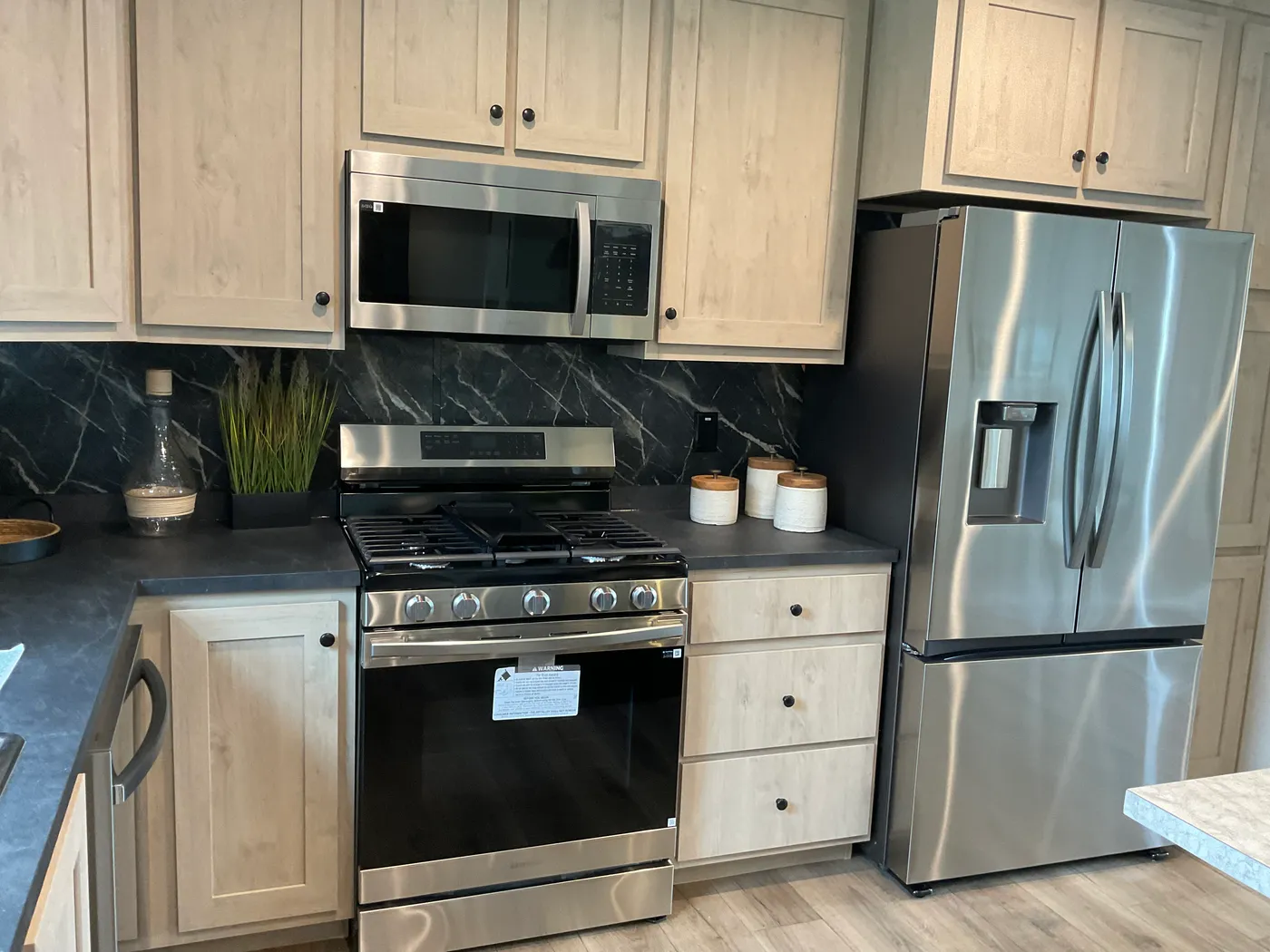 The EMERALD 7228-643 Kitchen. This Manufactured Mobile Home features 4 bedrooms and 2 baths.