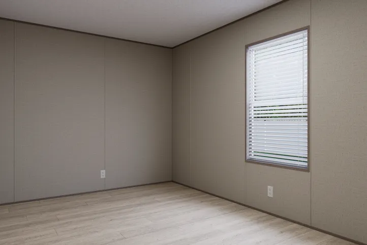 The THE ANNIVERSARY 76 Guest Bedroom. This Manufactured Mobile Home features 3 bedrooms and 2 baths.