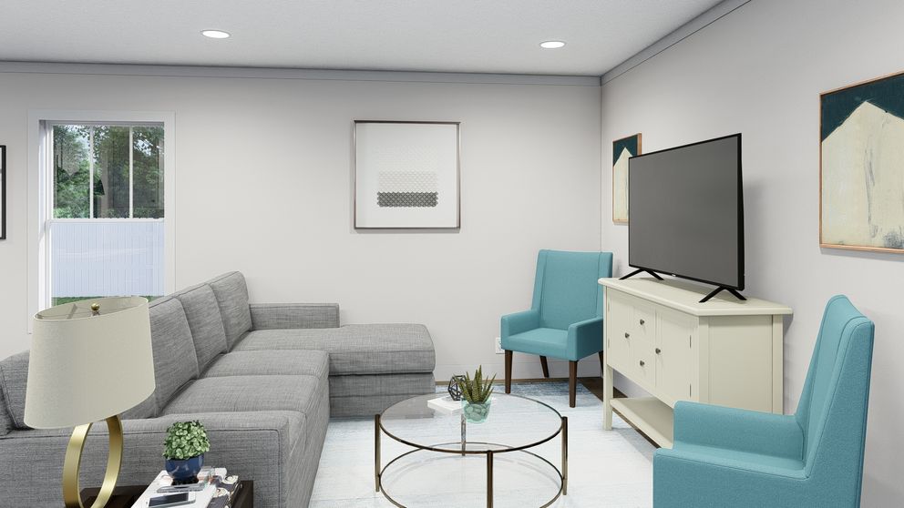 The BORN TO RUN Living Room. This Manufactured Mobile Home features 2 bedrooms and 2 baths.