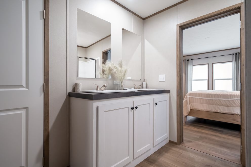 The VISTA Primary Bathroom. This Manufactured Mobile Home features 3 bedrooms and 2 baths.