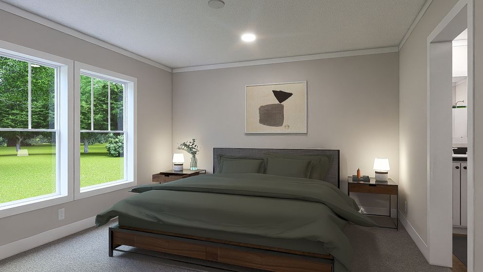 The WONDERFUL WORLD Primary Bedroom. This Modular Home features 3 bedrooms and 2 baths.