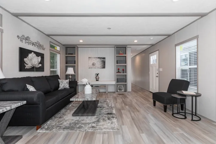 The THE ANNIVERSARY 76 Living Room. This Manufactured Mobile Home features 3 bedrooms and 2 baths.