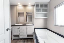 The ANNIVERSARY 16682A Primary Bathroom. This Manufactured Mobile Home features 2 bedrooms and 2 baths.
