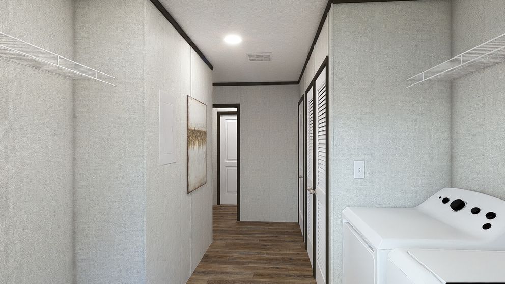 The EMPOWER Utility Room. This Manufactured Mobile Home features 4 bedrooms and 2 baths.
