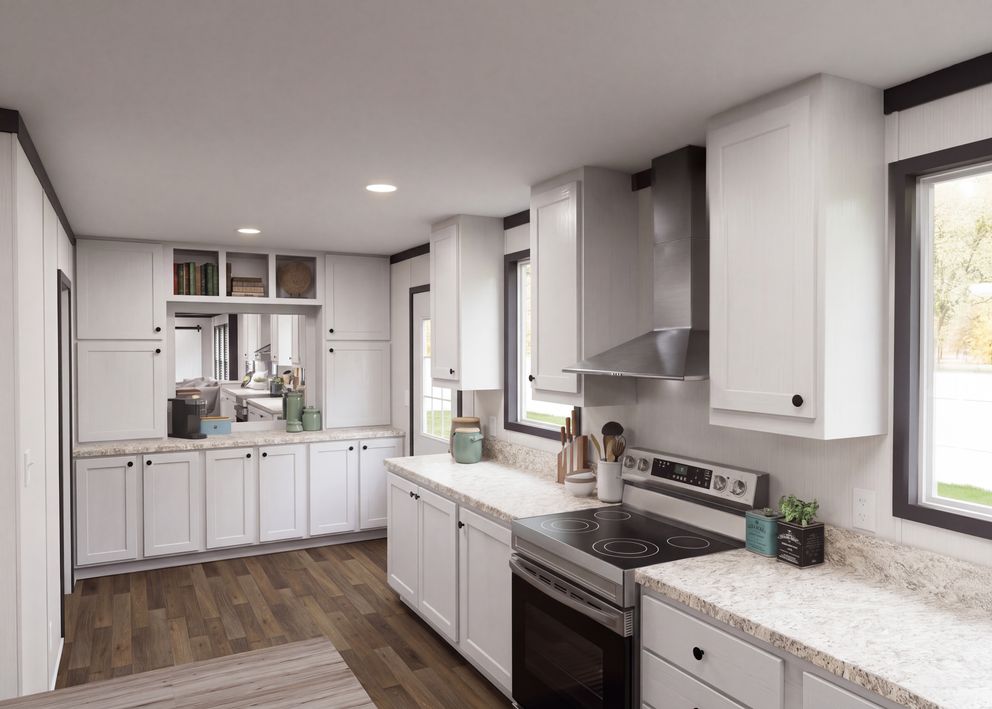 The THE FUSION 32H Kitchen. This Manufactured Mobile Home features 5 bedrooms and 3 baths.