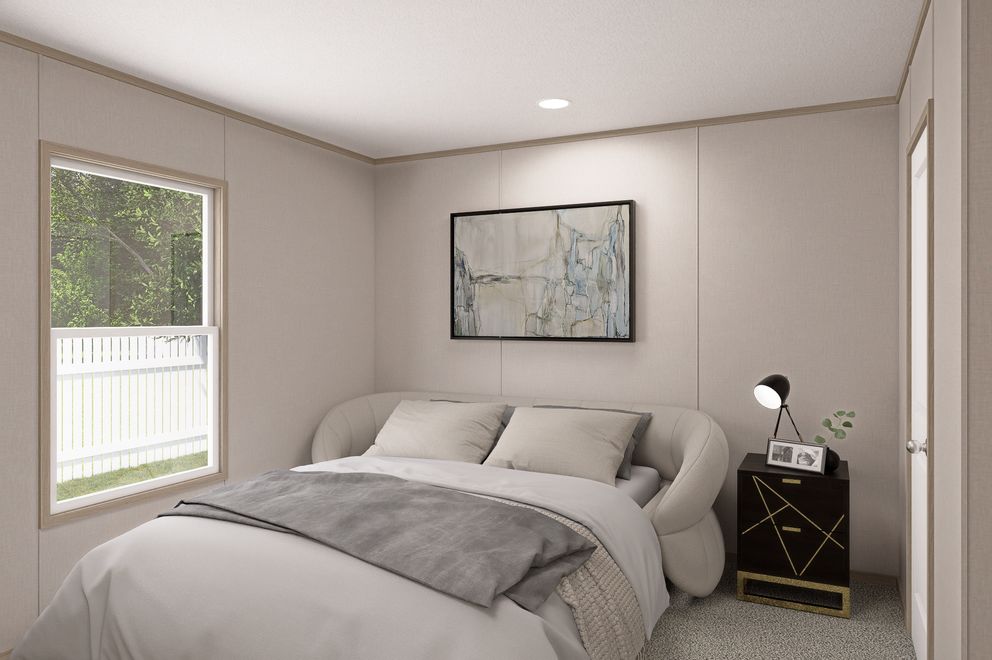 The THE EAGLE 68 Guest Bedroom. This Manufactured Mobile Home features 4 bedrooms and 2 baths.