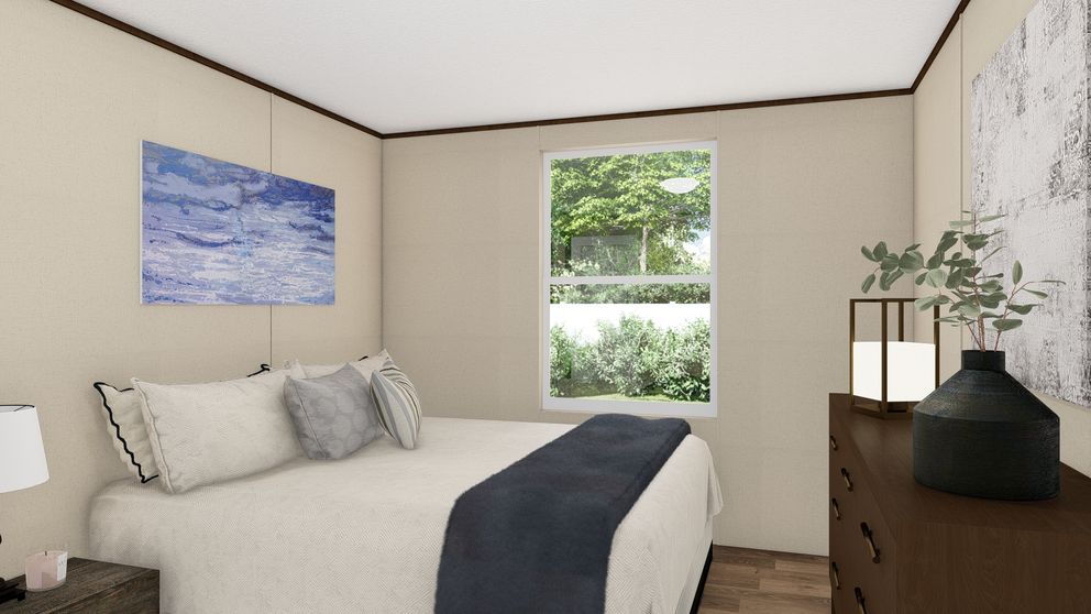 The MARVELOUS 3 Guest Bedroom. This Manufactured Mobile Home features 3 bedrooms and 2 baths.