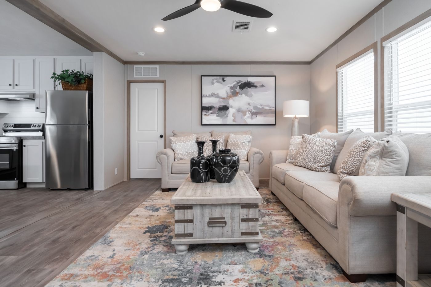 The PT 78 Living Room. This Manufactured Mobile Home features 3 bedrooms and 2 baths.
