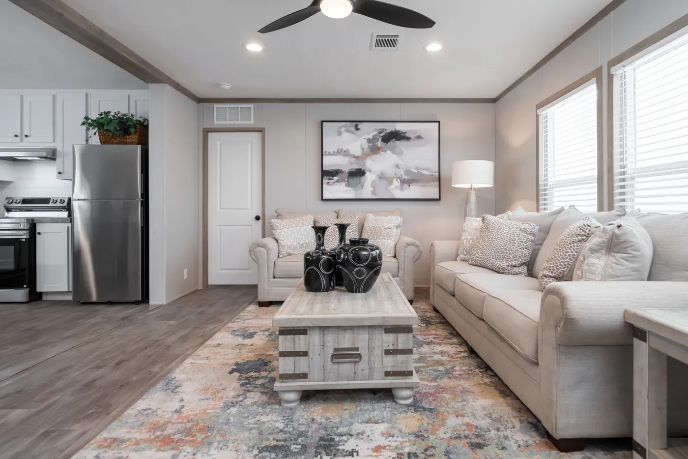 The PT 78 Living Room. This Manufactured Mobile Home features 3 bedrooms and 2 baths.