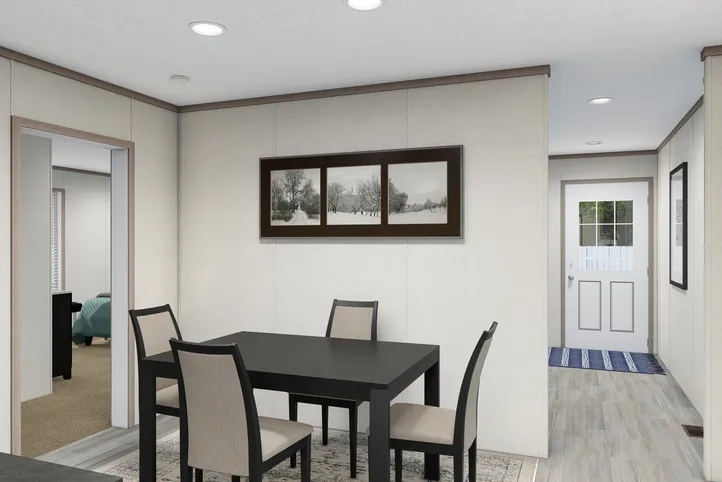 The 4828-E746 THE PULSE Dining Room. This Manufactured Mobile Home features 3 bedrooms and 2 baths.