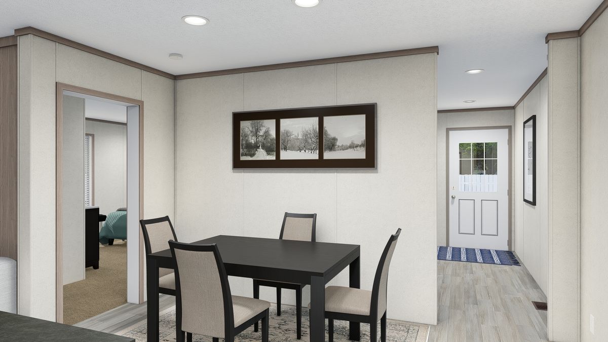 The 4828-E746 THE PULSE Dining Room. This Manufactured Mobile Home features 3 bedrooms and 2 baths.