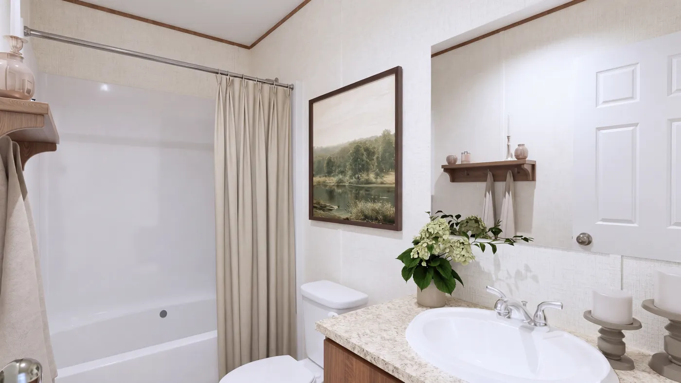 The ELM Primary Bathroom. This Manufactured Mobile Home features 2 bedrooms and 1 bath.