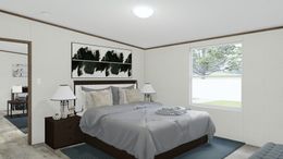 The EXCITEMENT Master Bedroom. This Manufactured Mobile Home features 3 bedrooms and 2 baths.