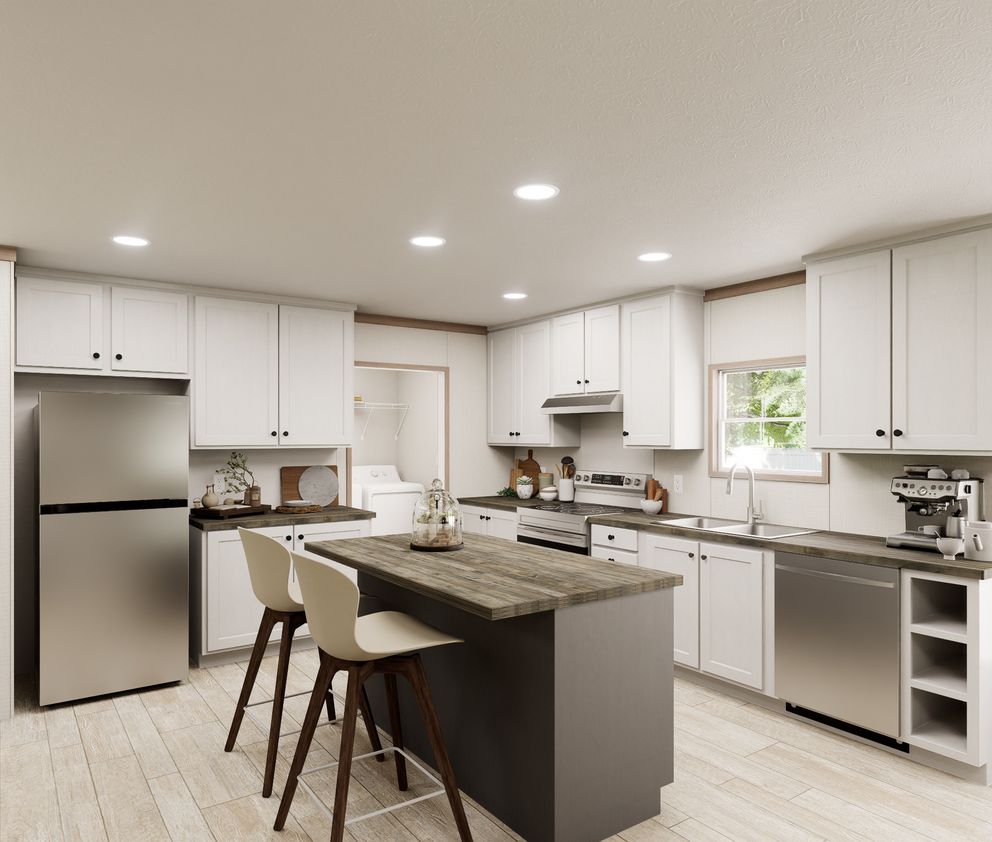 The ULTRA FLEX 60 Kitchen. This Manufactured Mobile Home features 3 bedrooms and 2 baths.
