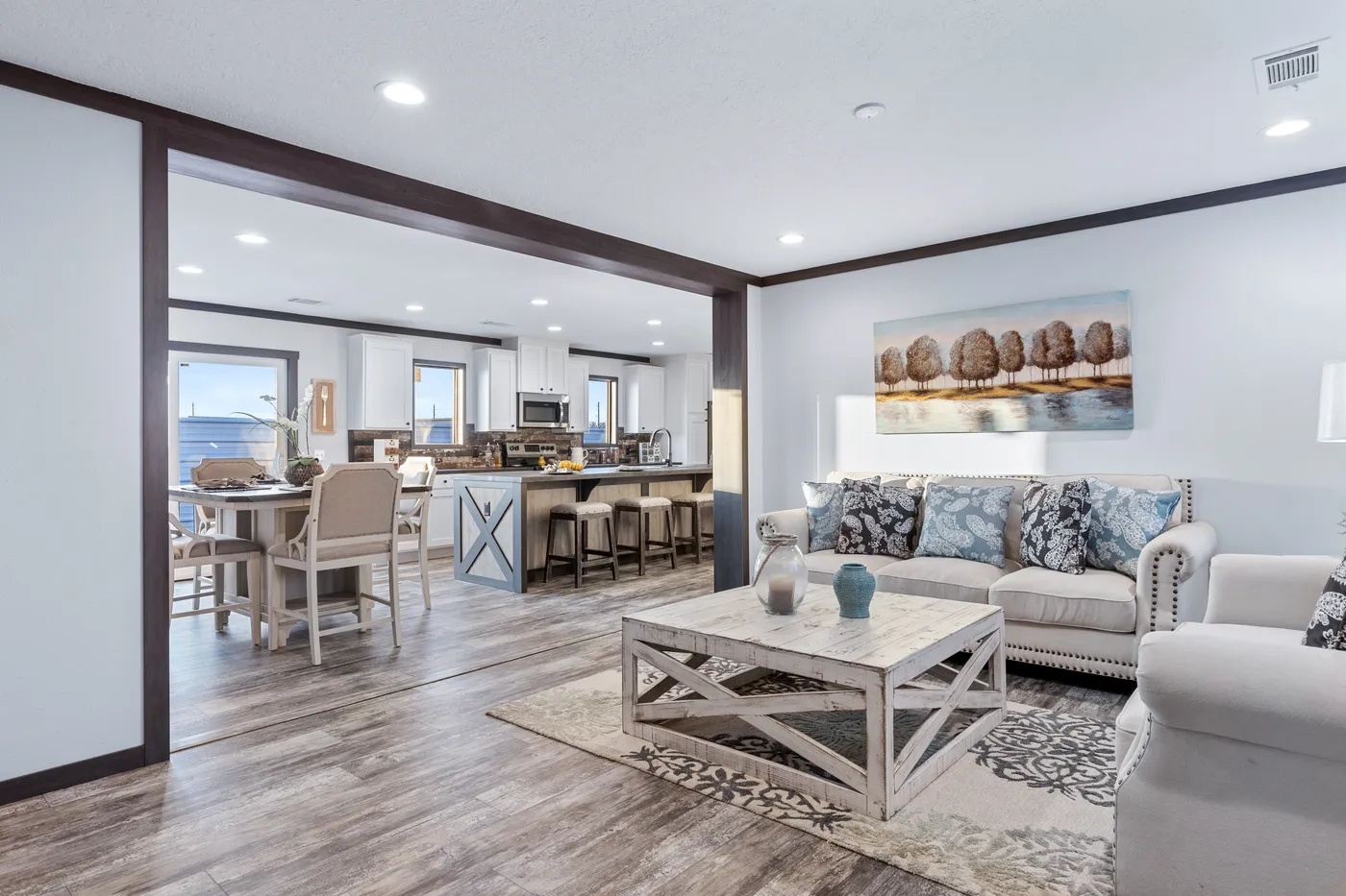 The BOUJEE XL Living Room. This Manufactured Mobile Home features 4 bedrooms and 3 baths.