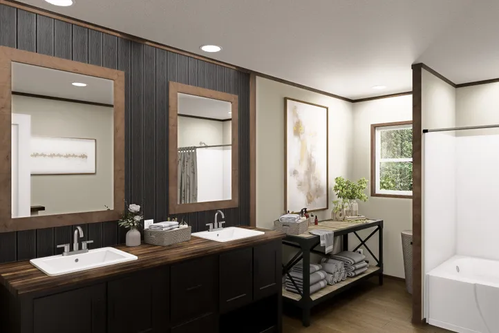 The EVEREST Primary Bathroom. This Manufactured Mobile Home features 4 bedrooms and 2 baths.