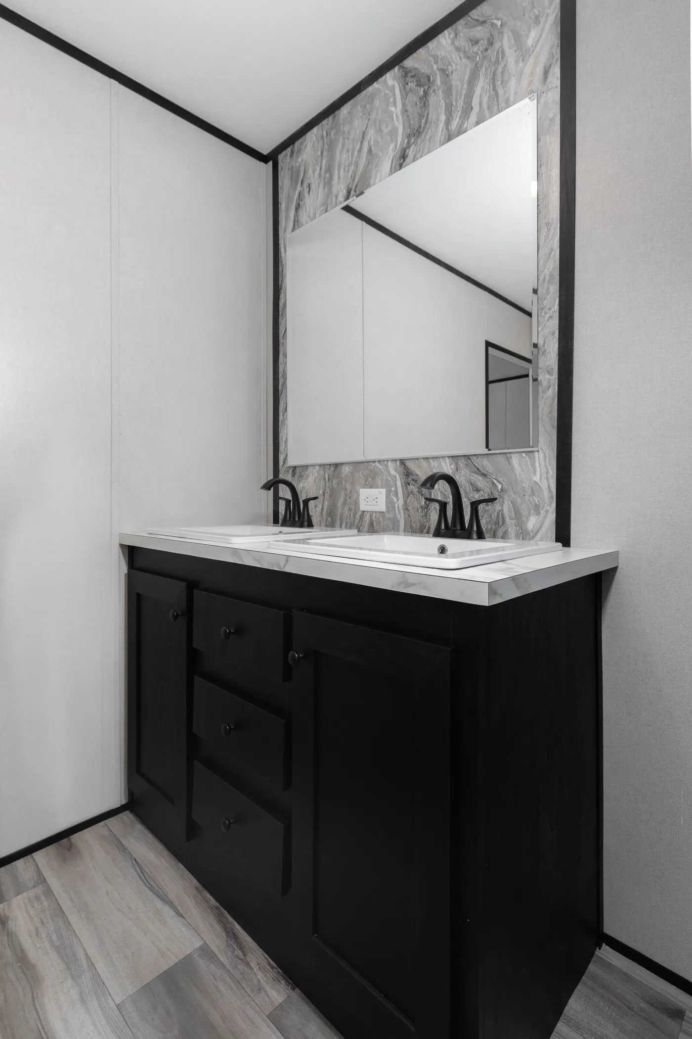 The THE SMOKEY Primary Bathroom. This Manufactured Mobile Home features 3 bedrooms and 2 baths.