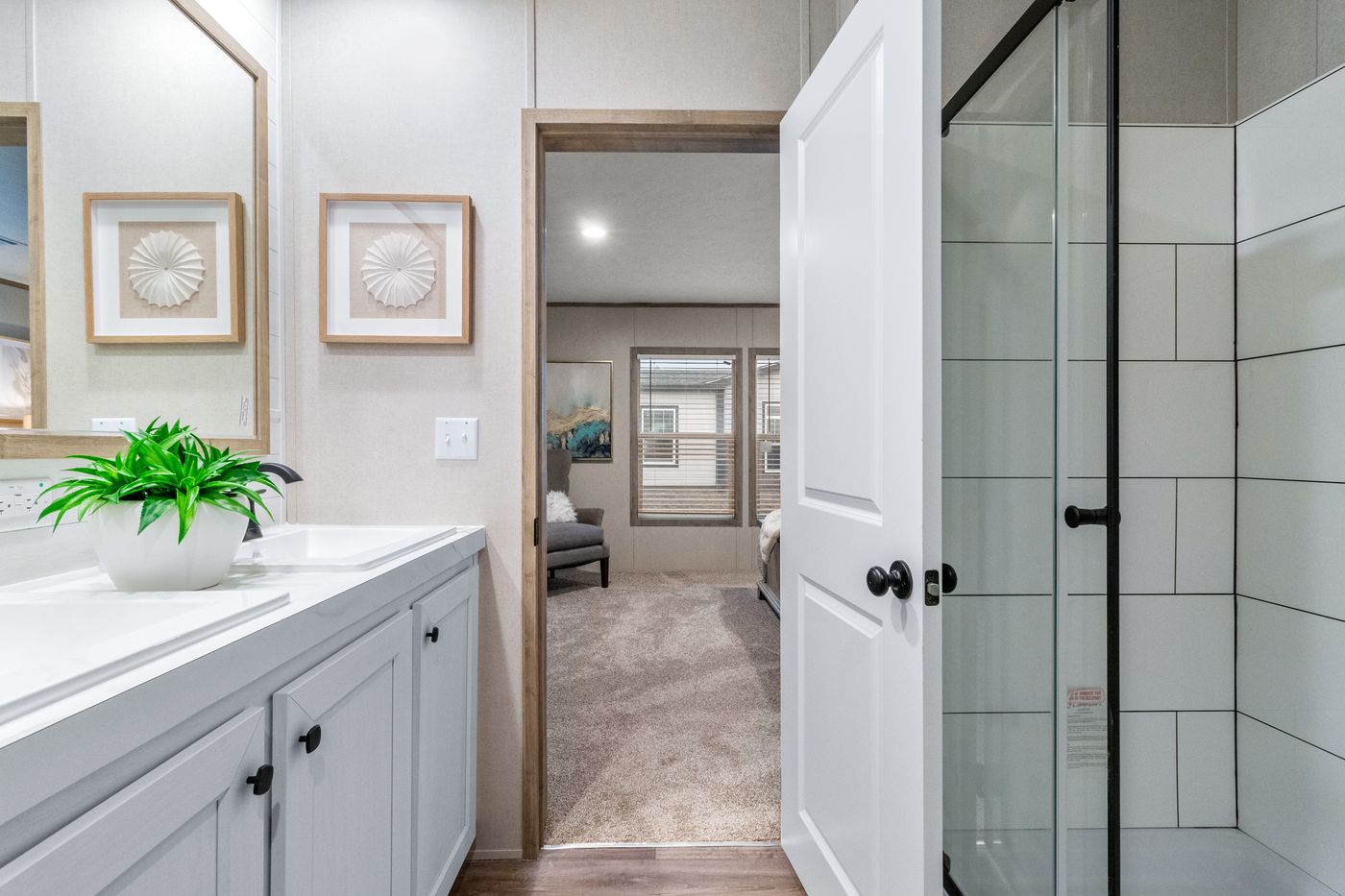 The THE CHOICE Primary Bathroom. This Manufactured Mobile Home features 4 bedrooms and 2 baths.