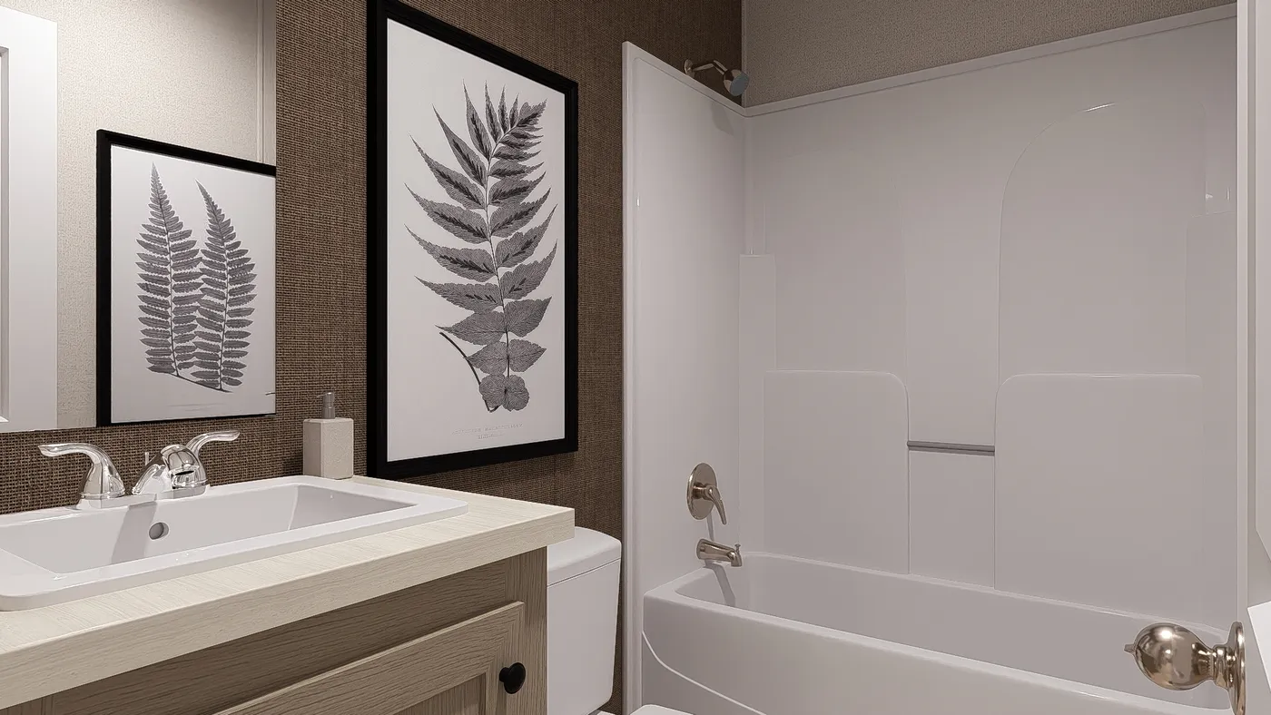 The BLAZER 66 B Guest Bathroom. This Manufactured Mobile Home features 3 bedrooms and 2 baths.