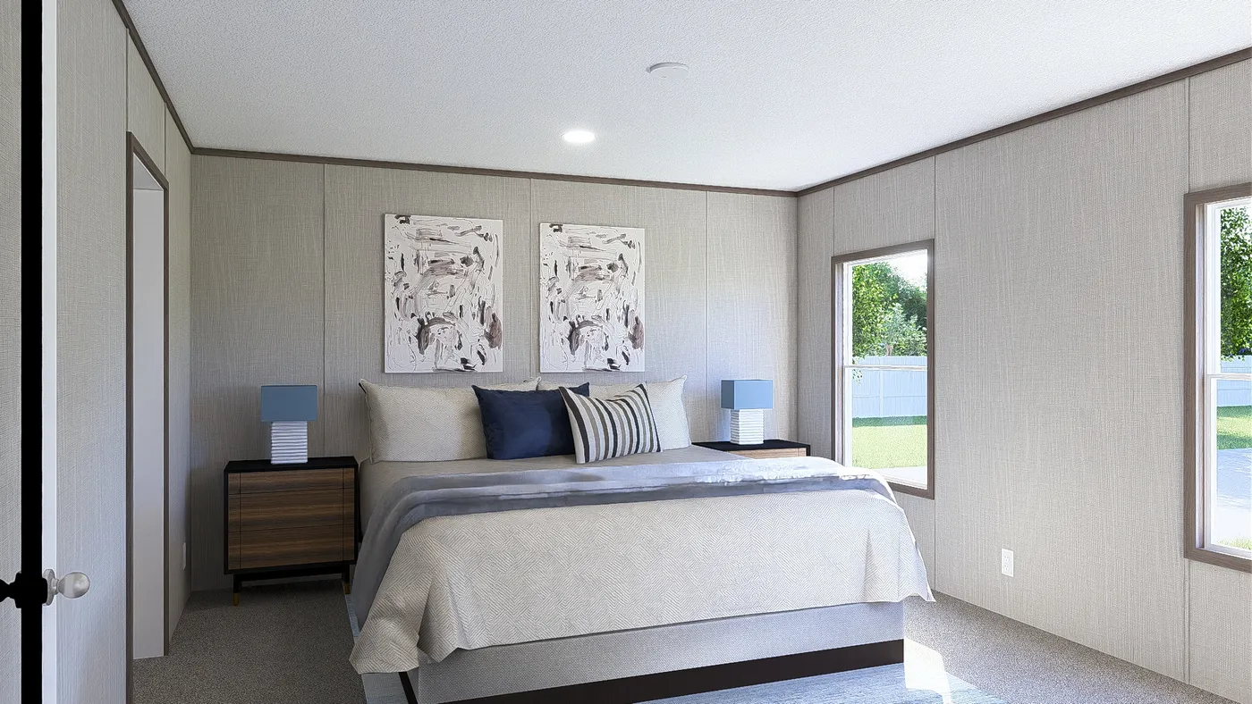 The ULTRA BREEZE 28X76 Primary Bedroom. This Manufactured Mobile Home features 4 bedrooms and 2 baths.